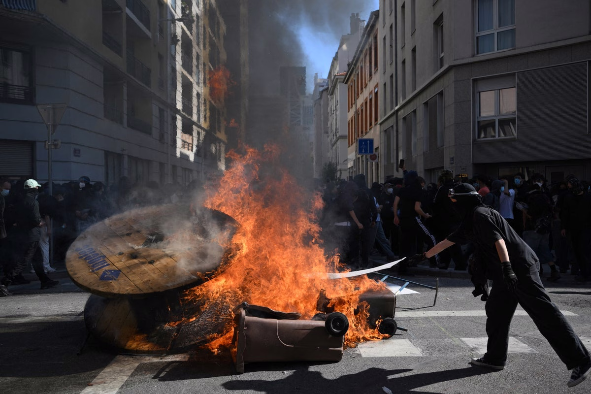 French student protests escalate as riot police deploy tear gas and water cannons